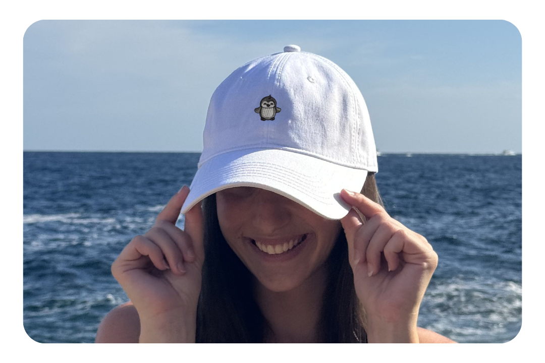 Penguin Adoption Cap